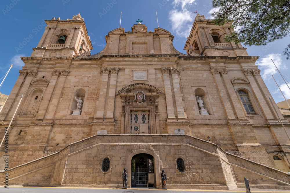 The facade of the Collegiate Church of Saint Lawrence, Vittoriosa, Malta - obrazy, fototapety, plakaty 