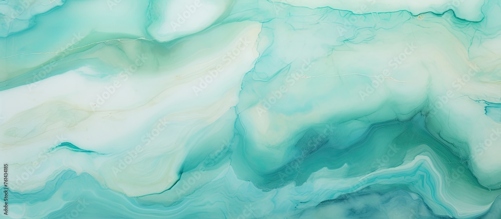 A close up of a fluid and electric blue watercolor painting with a pattern of green and white cumulus clouds. It is a unique art piece that can also be used as a fashion accessory