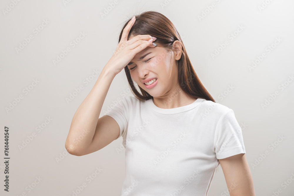 Dizzy asian young woman, girl headache or migraine pain suffering from vertigo while sitting on couch in living room at home, holding head with hand, health problem of brain or inner ear not balance. Dizzy asian young woman, girl headache or migraine pain suffering from vertigo while sitting on couch in living room at home, holding head with hand, health problem of brain or inner ear not balance.
