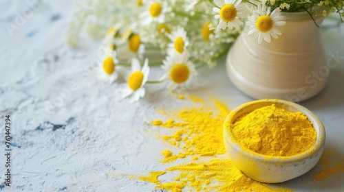 Natural and Aromatic Yellow Powder in a Bowl with Daisy Flowers  Happy Holi Festival Concept.