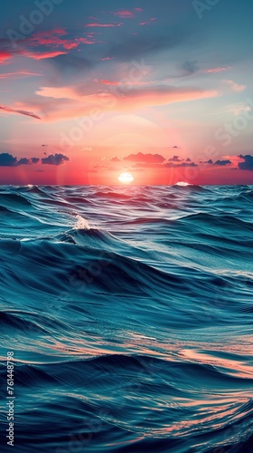 abstract background with blue undulating sea under a bright colored sunset sky © Svitlana