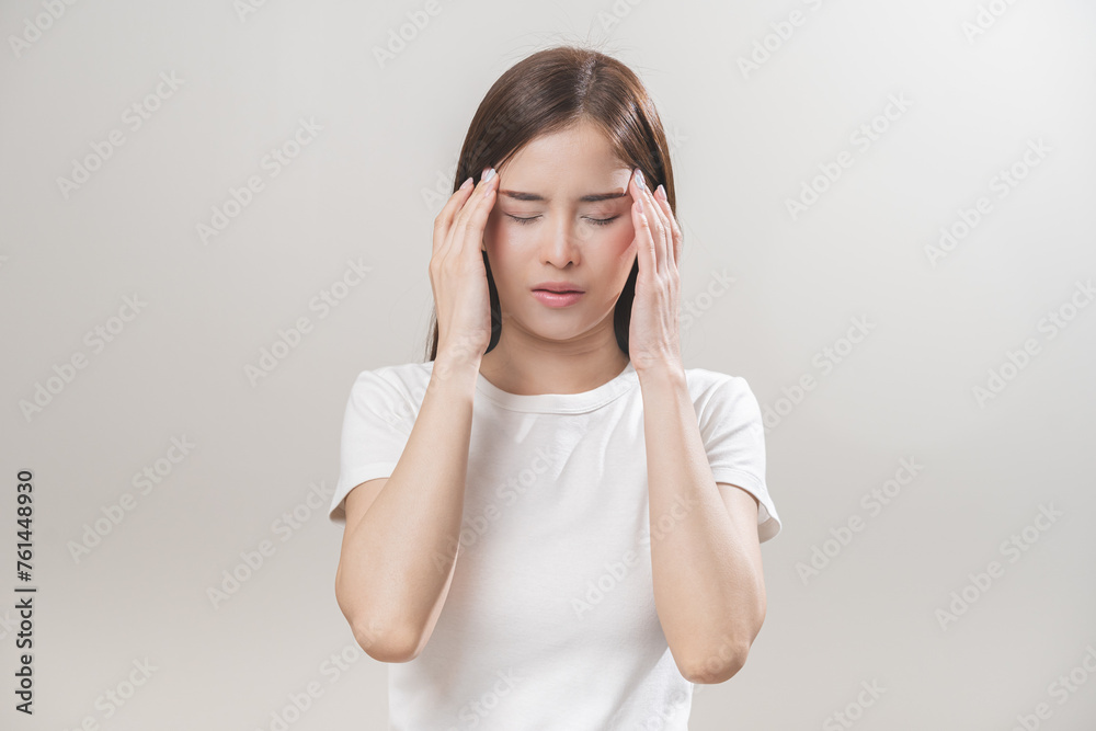 Dizzy asian young woman, girl headache or migraine pain suffering from vertigo while sitting on couch in living room at home, holding head with hand, health problem of brain or inner ear not balance. Dizzy asian young woman, girl headache or migraine pain suffering from vertigo while sitting on couch in living room at home, holding head with hand, health problem of brain or inner ear not balance.