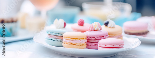 A variety of colorful macarons are arranged on a white plate with a blurred background in the image art category of food and drink with a still life subject and pastel colors.