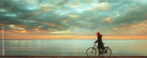 woman on bicycle on promenade