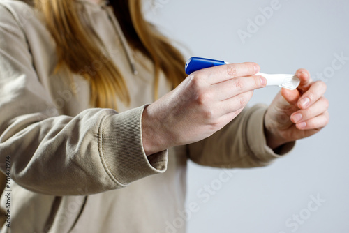 woman with pregnancy test. pregnancy planning. portable pregnancy test photo