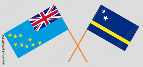 Crossed flags of Tuvalu and Country of Curacao. Official colors. Correct proportion