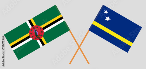 Crossed flags of Dominica and Country of Curacao. Official colors. Correct proportion