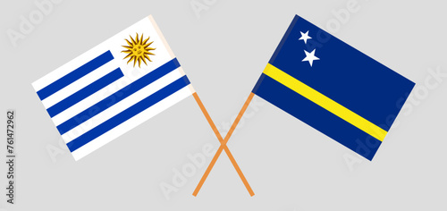 Crossed flags of Uruguay and Country of Curacao. Official colors. Correct proportion