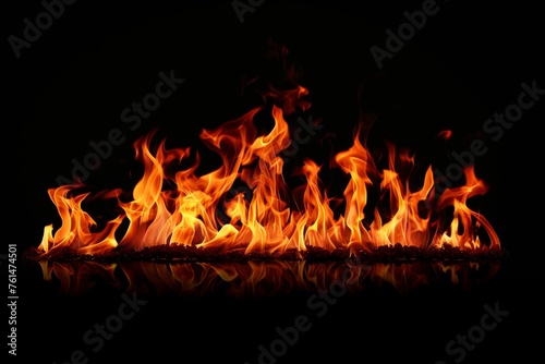 Fire flames on a black background an abstract concept.