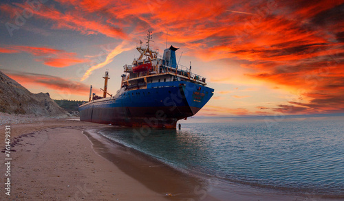 A ship washed ashore, photographed day and night