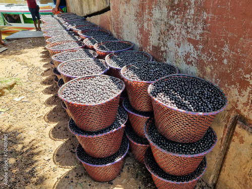 Amapá-paneiros with açai in the port of Igarapé Fortaleza, Santana