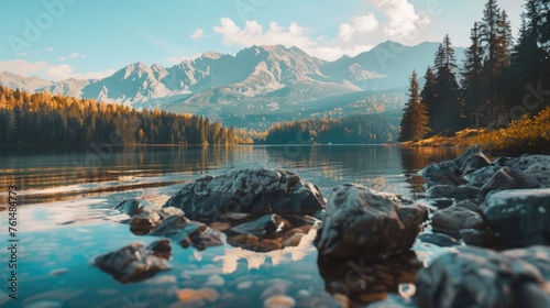 A peaceful body of water surrounded by trees and rocks. Perfect for nature and travel concepts