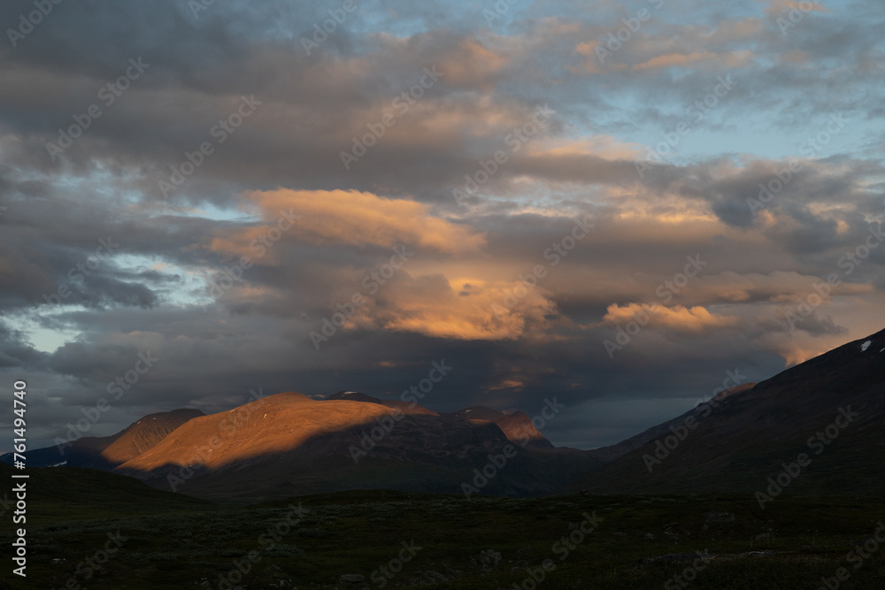Dramatic evening skies over the Sarek National Park, Sweden. Summer landscape of Northern Europe mountain wilderness.