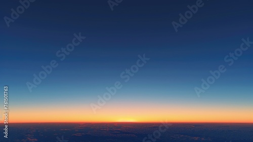 Airplane wing with sun setting in the background. Perfect for travel or aviation themes