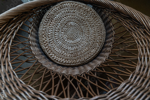 Wicker basket made of rattan in the interior of a cafe