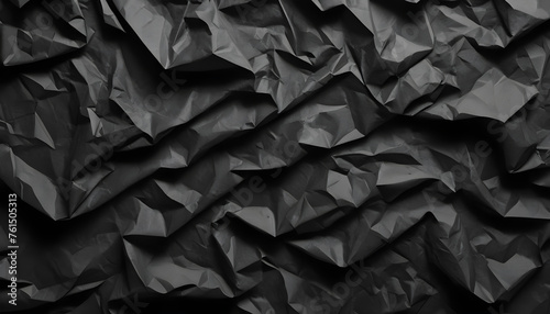 Black crumpled paper texture photo