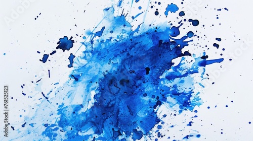 Blue paint splattered on a white surface. Suitable for artistic projects