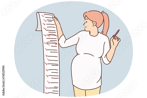 Pregnant woman hold long to do list