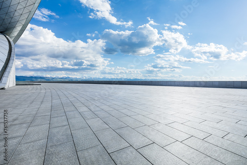 Empty square floor and sky clouds natural background © ABCDstock