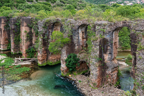 View of the archaeological site of the Roman aqueduct of the ancient Nikopolis in Epirus, Greece photo