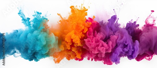 A row of colorful ink splashes in petal pink, violet, magenta, and electric blue on a white background, resembling a beautiful natural material art display for an event photo
