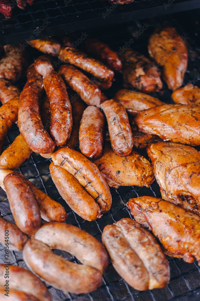 Pork being barbequed in a southern style pit over hickory wood. Pork being barbequed in a southern style pit over hickory wood.