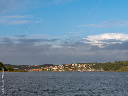 Panorama of Mariager Fjord coastline with forested hills, Hobro, Himmerland, Nordjylland, Denmark,