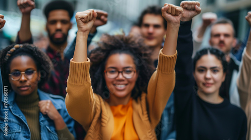 Multi ethnic people raising their fists up in the air. Multi-ethnic group of men waving.  people holding their fists at a protest rally, Ai generated image © Trendy Three