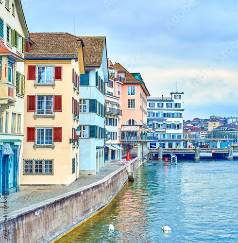 Limmat river and riverside buildings on Wuhre street, Zurich, Switzerland