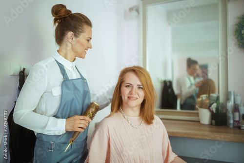 woman hairdresser in modern beauty salon