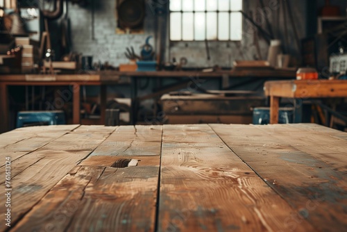 A repair shop interior with a wooden table in the foreground, offering a vacant space for tools or materials. photo