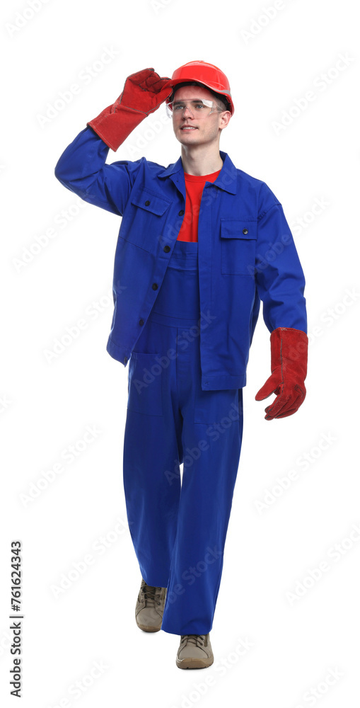 Young man wearing safety equipment on white background Young man wearing safety equipment on white background