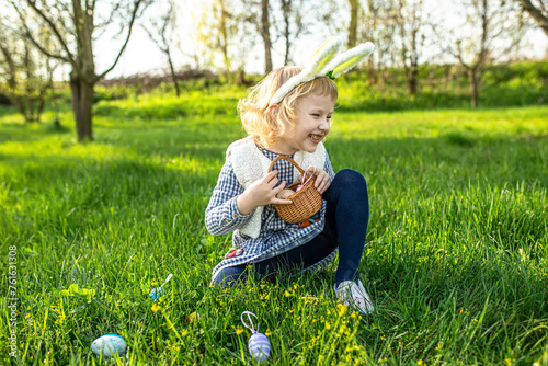 Canvas Print Excited child joins the Easter hunt, gleefully gathering eggs in their basket, creating memories of laughter and fun