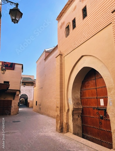 wooden gate in the small streets of Marrakech, Morocco