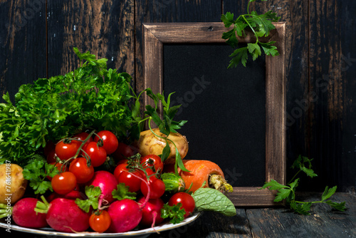 plate with fresh seasonal vegetables and background for text, closeup