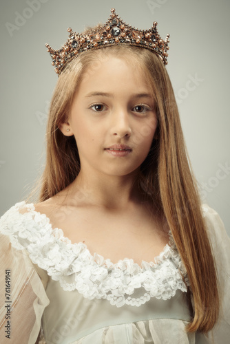 Young Girl Wearing A Stately Crown