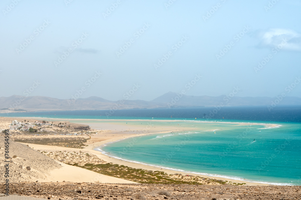 Stunning morning view of the islands of Lobos and Lanzarote seen from Corralejo Beach (Grandes Playas de Corralejo) on Fuerteventura, Canary Islands, Spain, Stunning morning view of the islands of Lobos and Lanzarote seen from Corralejo Beach (Grandes Playas de Corralejo) on Fuerteventura, Canary Islands, Spain,