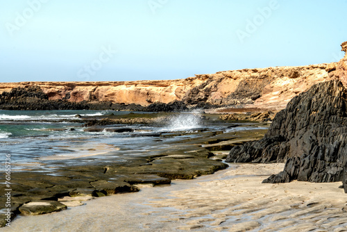 Sandy Beach with Coastal Cliffs in Fuerteventura, Canary Islands