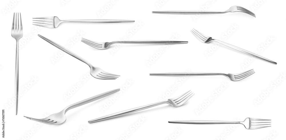 Shiny silver forks isolated on white, set Shiny silver forks isolated on white, set
