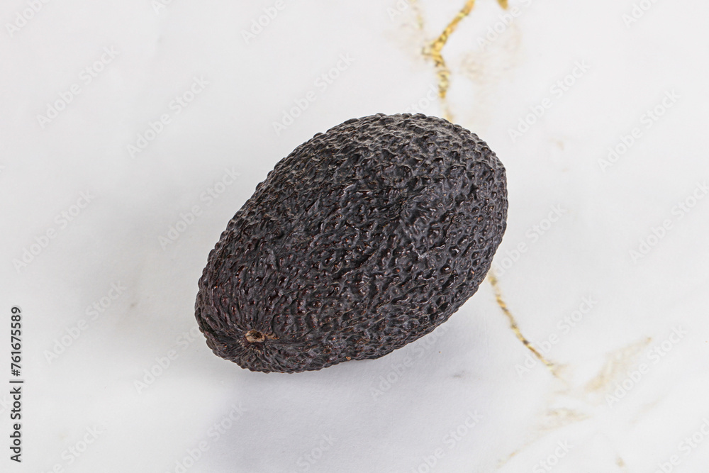 Fototapeta premium Ripe raw whole avocado fruit