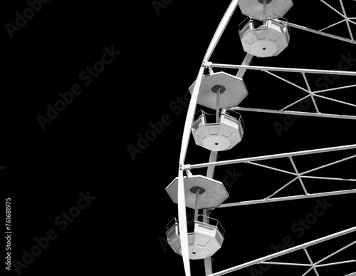 White ferris wheel on the black background. Copy space. Close-up.