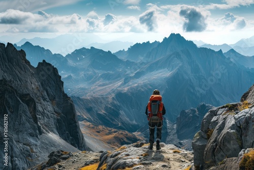 A person stands proudly on top of a towering mountain, overlooking the vast landscape below, A backpacker facing a challenging rocky terrain in a rugged mountain range, AI Generated