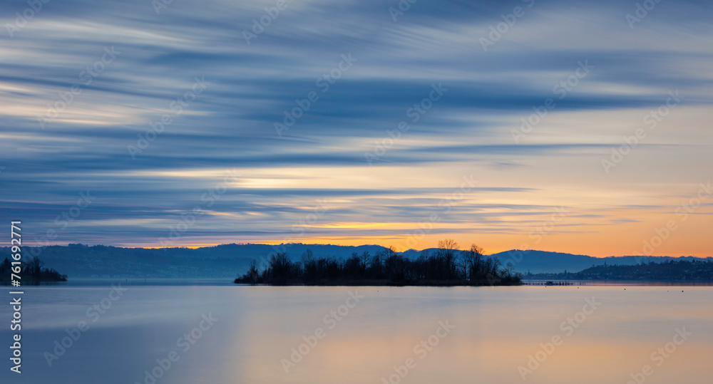beautiful sunset at lake zurich, long exposure