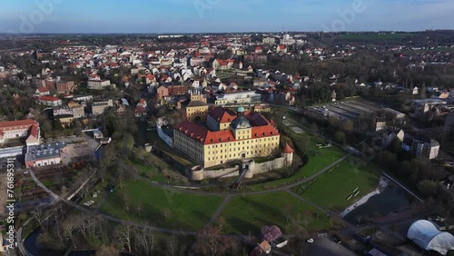 Flight around the Zeitz castle park. The historic old town in the background. Moritzburg Castle dominates the skyline. Small town in Saxony-Anhalt. photo