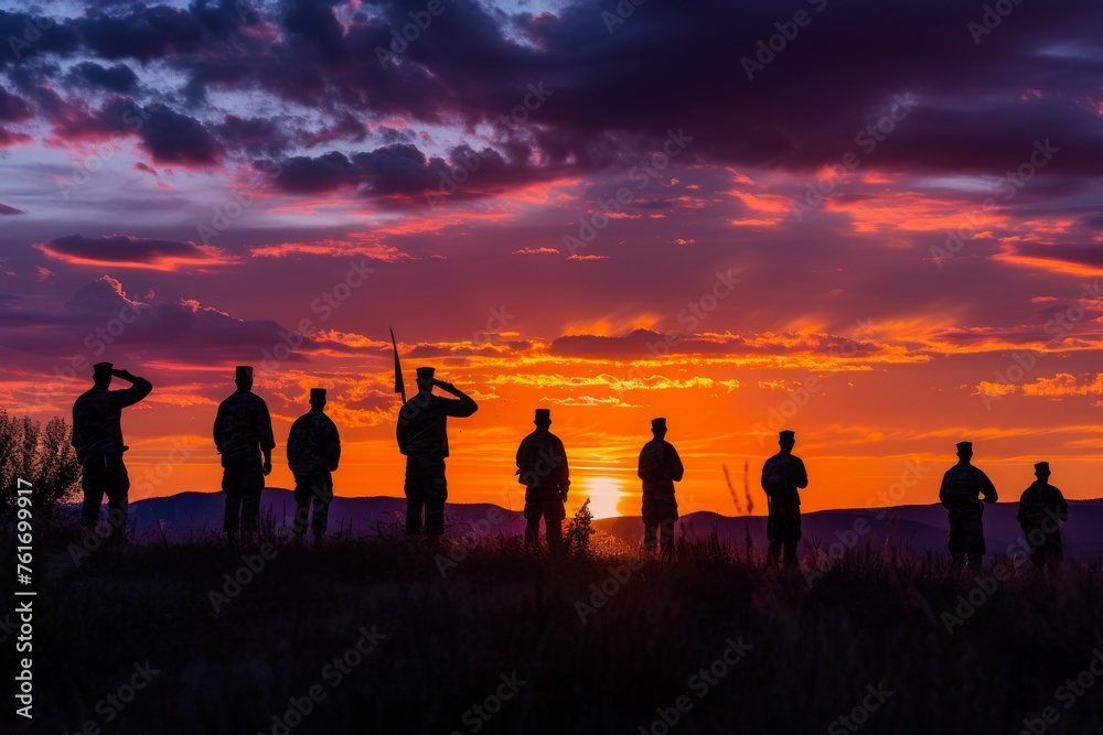 Fototapeta premium A group of individuals standing on the grass covered field, enjoying the view and engaging in conversation, A military salute in front of a Memorial Day dawn, AI Generated