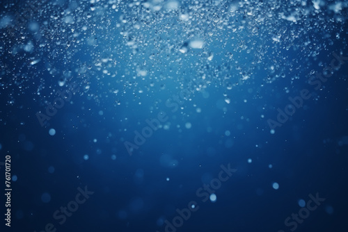 abstract blue background with some smooth lines and highlights made of water droplets