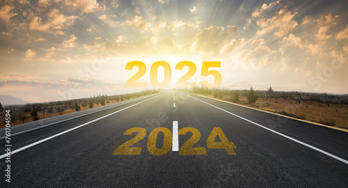 Change of calendar. 2024 anniversary. Transition from 2023 to the new year. Golden sunrise on asphalt empty road. New year concept with the number 2024 on the horizon.