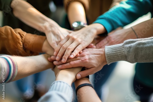 A group of people with their hands together. Business teamwork and support