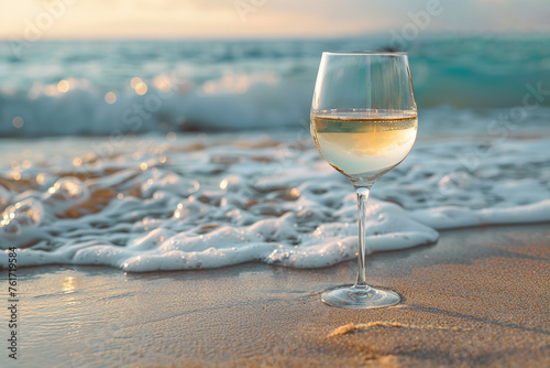 A glass of wine on the seashore. Sea surf