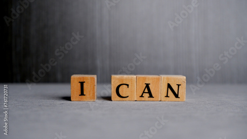I can motivation speech concept on wooden block.